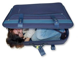 Girl in suitcase (photo by MaxMilli0n)