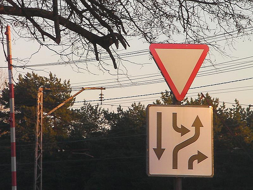 Caution. Which way to turn? (photo by tm-tm) (CC BY-SA 2.0)